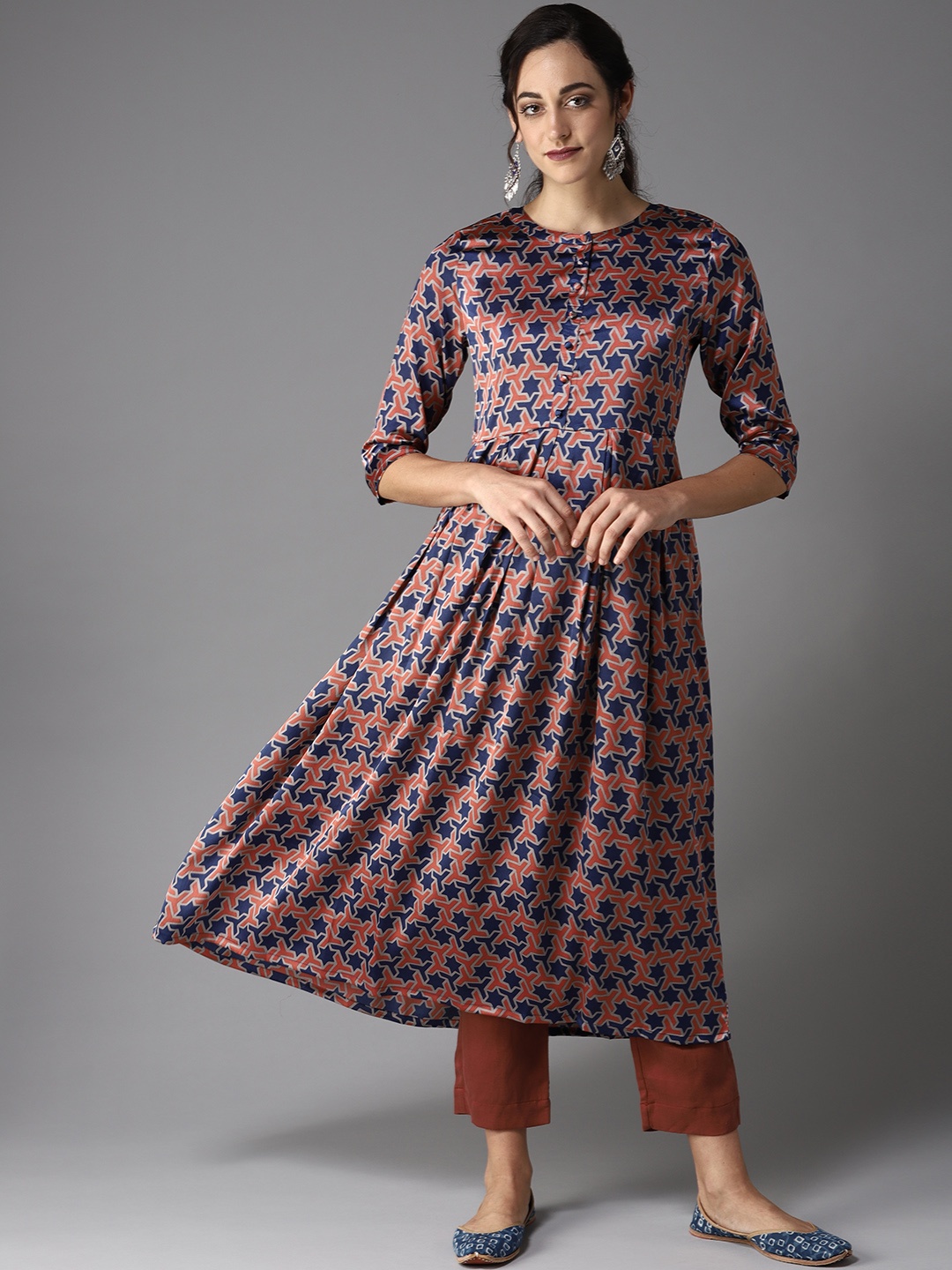 

Moda Rapido Women Rust Orange & Navy Blue Printed A-Line Kurta