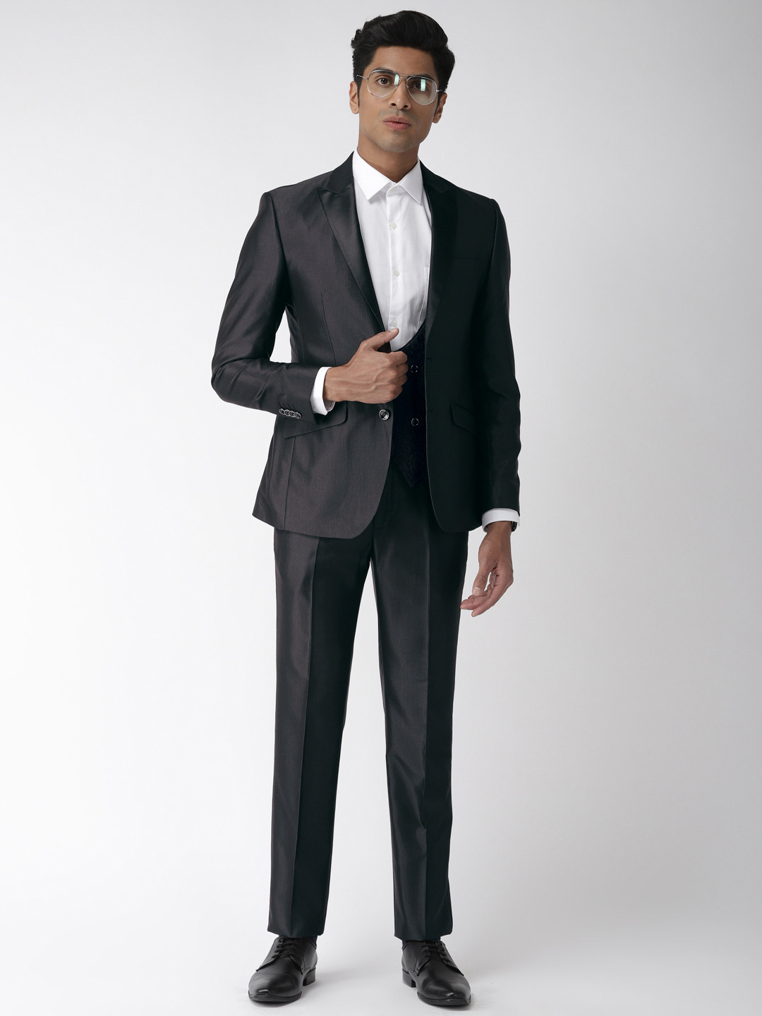

Park Avenue Charcoal Grey Self Design Super Slim Fit Tuxedo