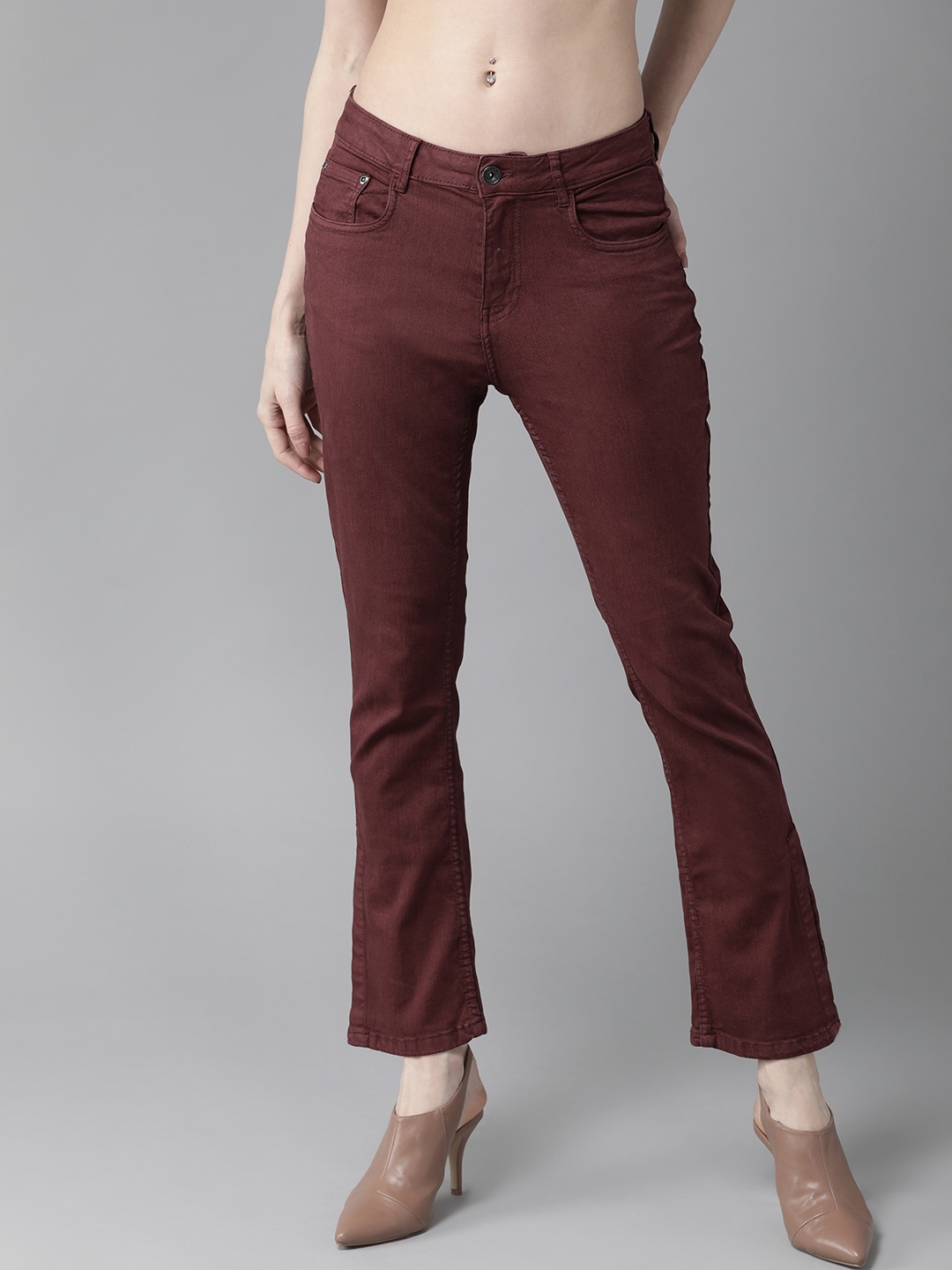 

The Roadster Lifestyle Co Women Burgundy Regular Fit Solid Regular Trousers