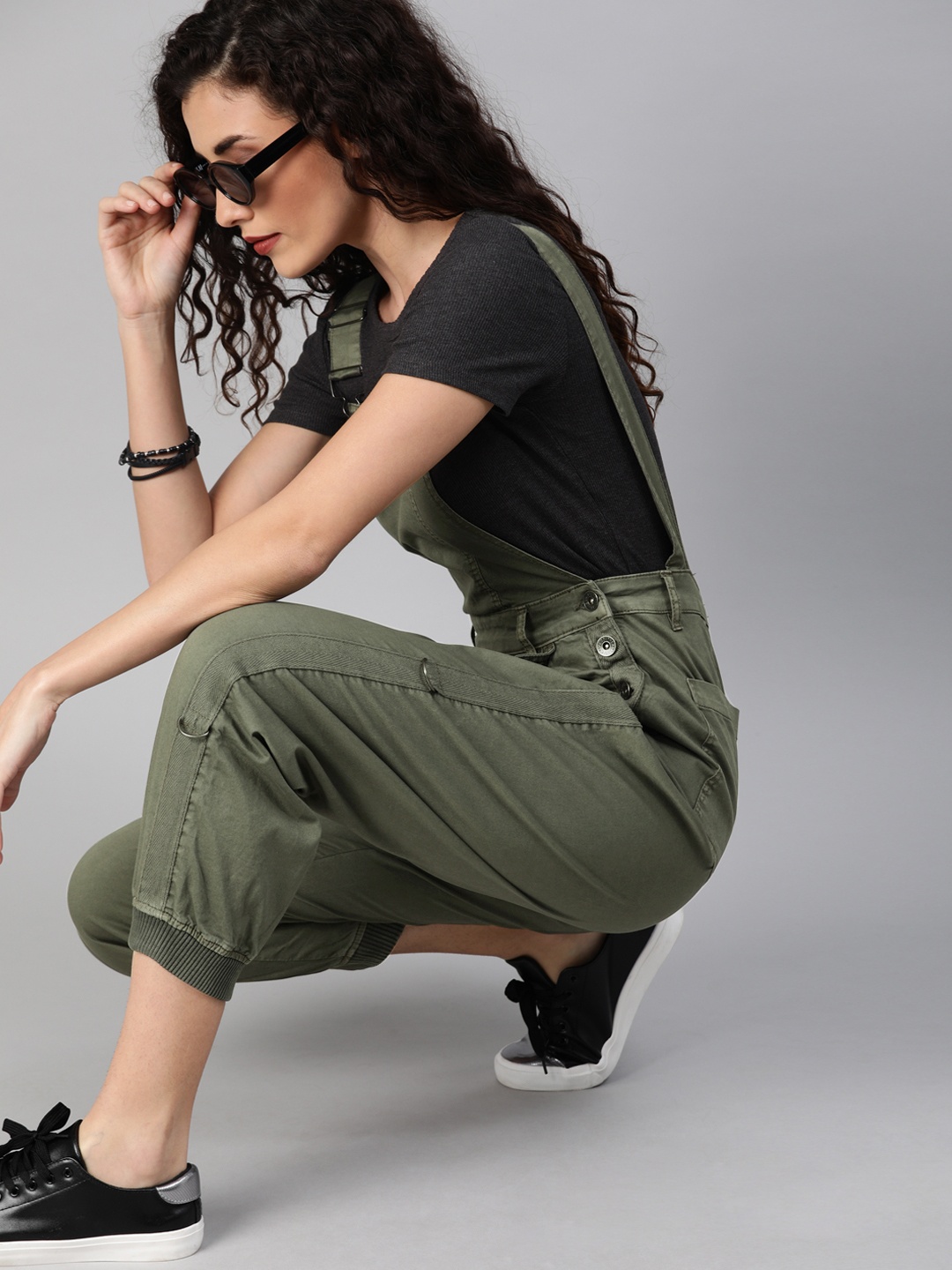 

The Roadster Lifestyle Co Women Olive Green Solid Jogger Dungarees