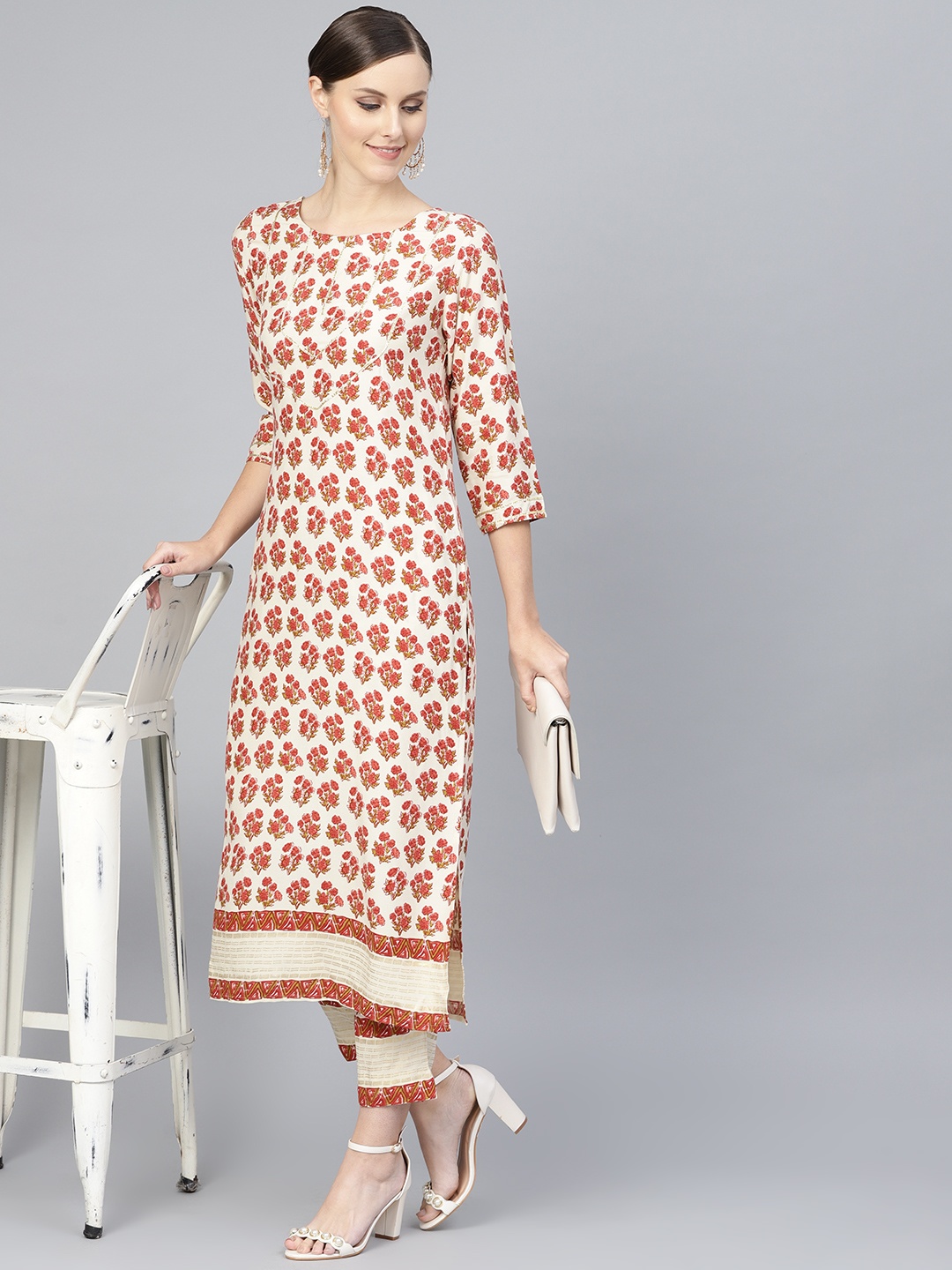 

Ahalyaa Women Off-White & Rust Red Printed Kurta with Trousers