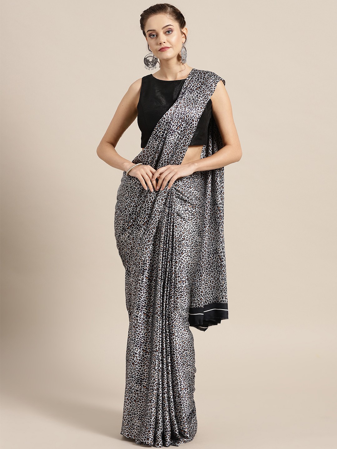 

Rajesh Silk Mills Grey & Black Animal Print Saree