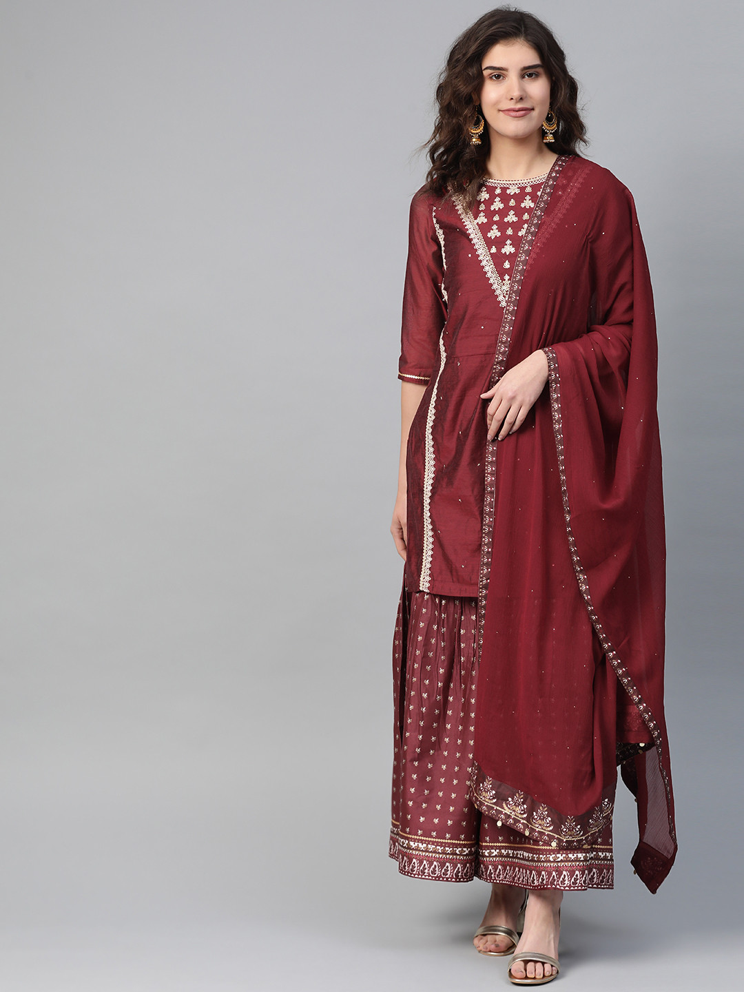 

W Women Maroon & Golden Embroidered Kurta with Sharara & Dupatta