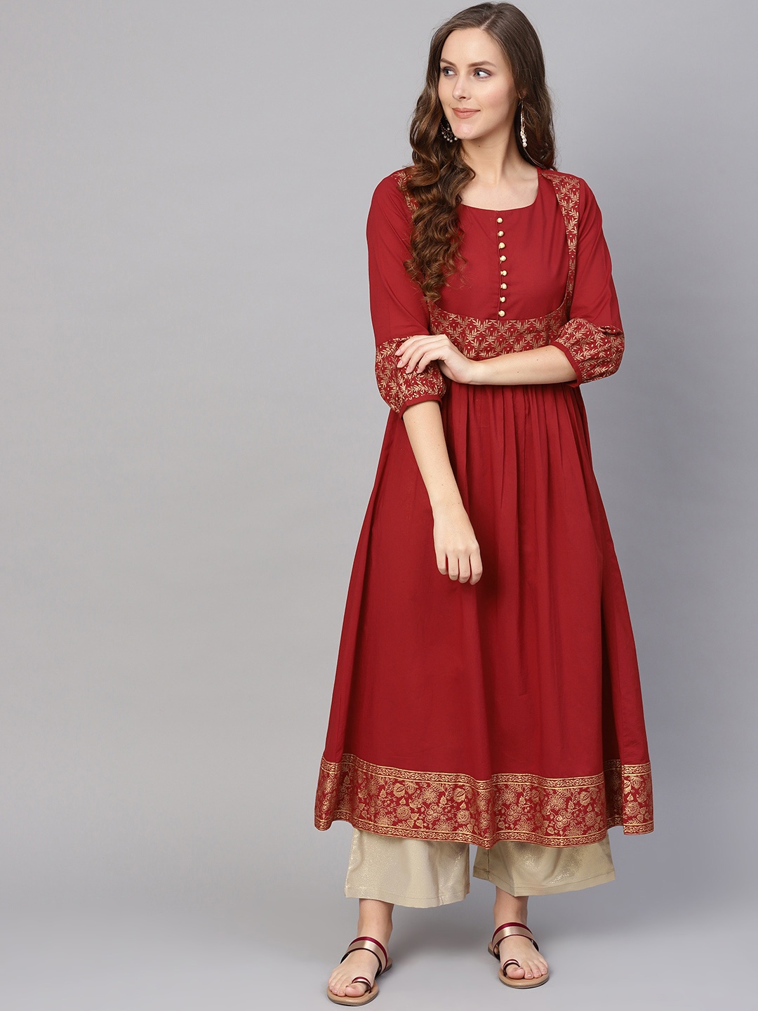 

Varanga Women Maroon & Golden Yoke Design A-Line Kurta