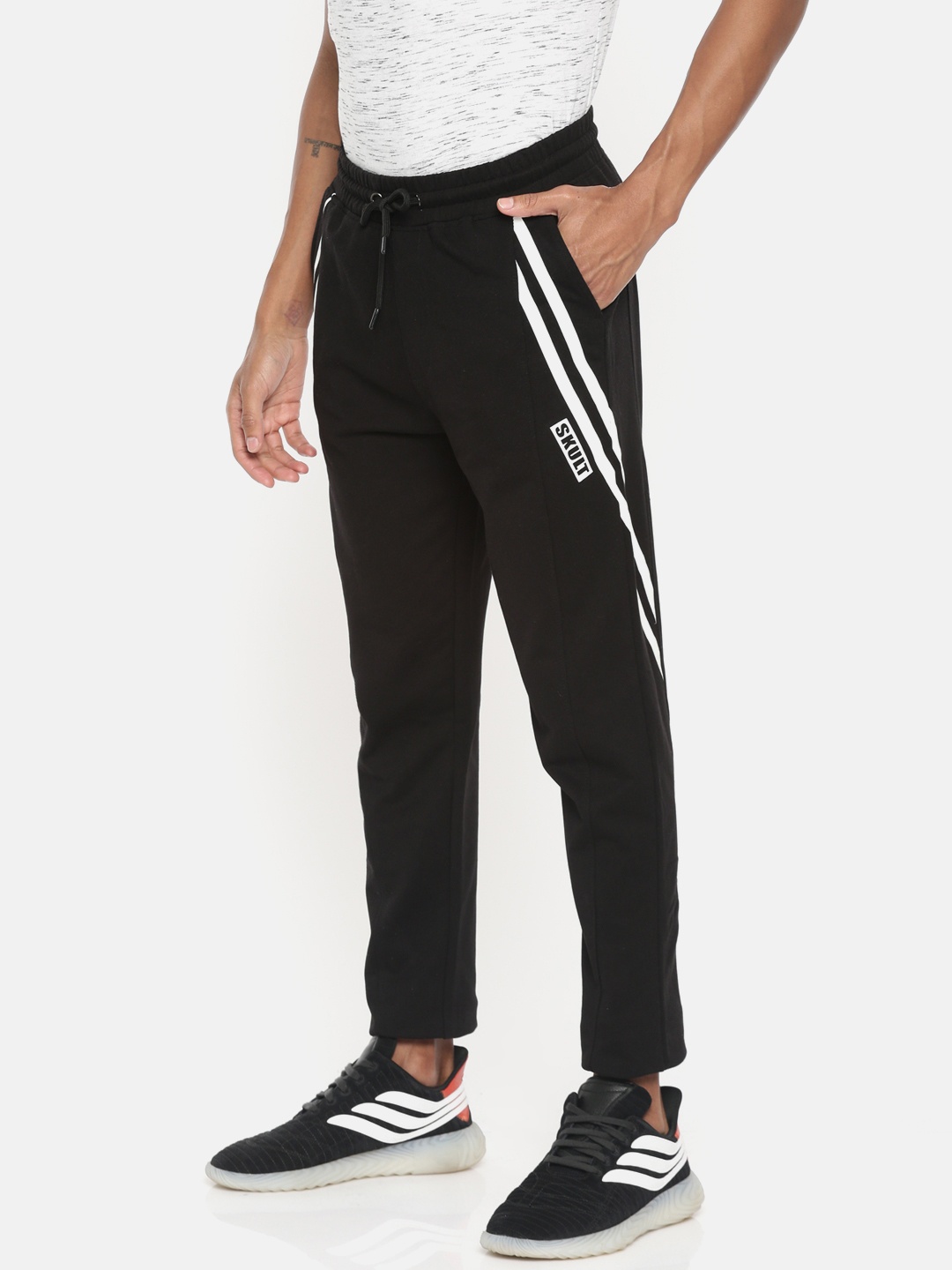 

SKULT by Shahid Kapoor Men Black Solid Slim Fit Track Pants