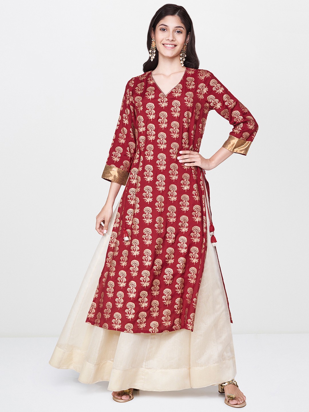 

Global Desi Women Maroon & Golden Printed Straight Kurta
