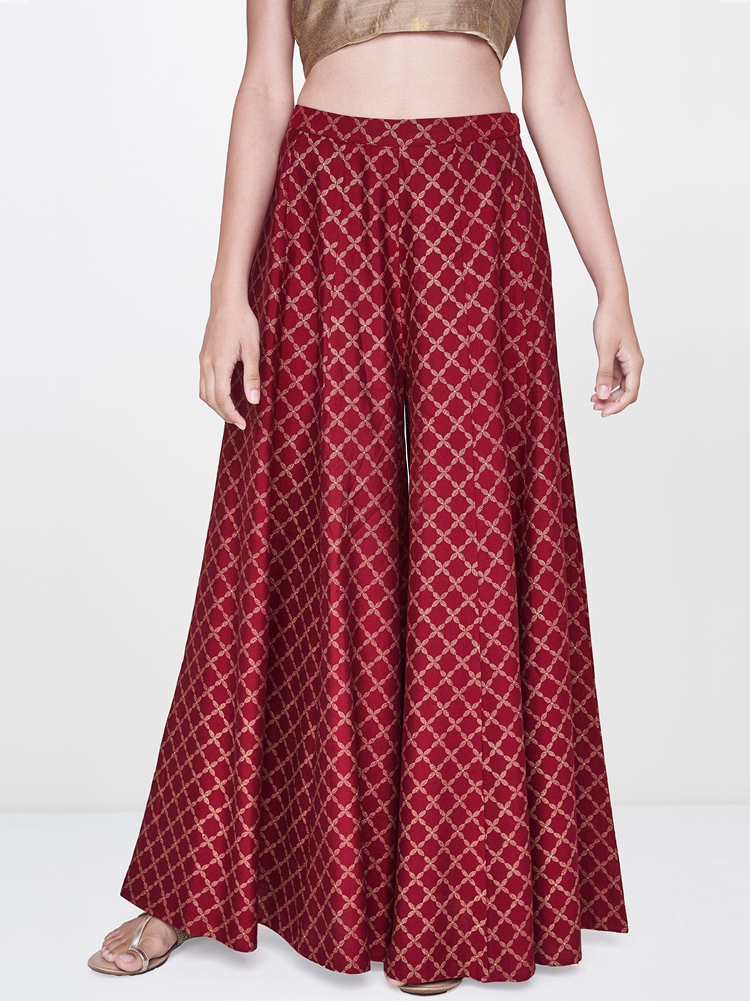 

Global Desi Women Maroon & Gold-Toned Printed Flared Palazzos