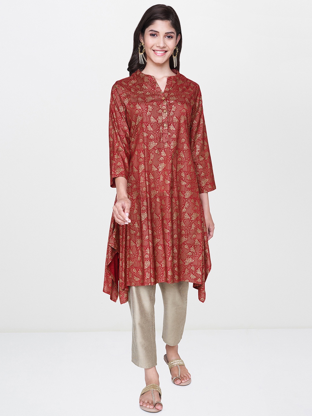 

Global Desi Women Maroon & Gold-Coloured Printed Tunic