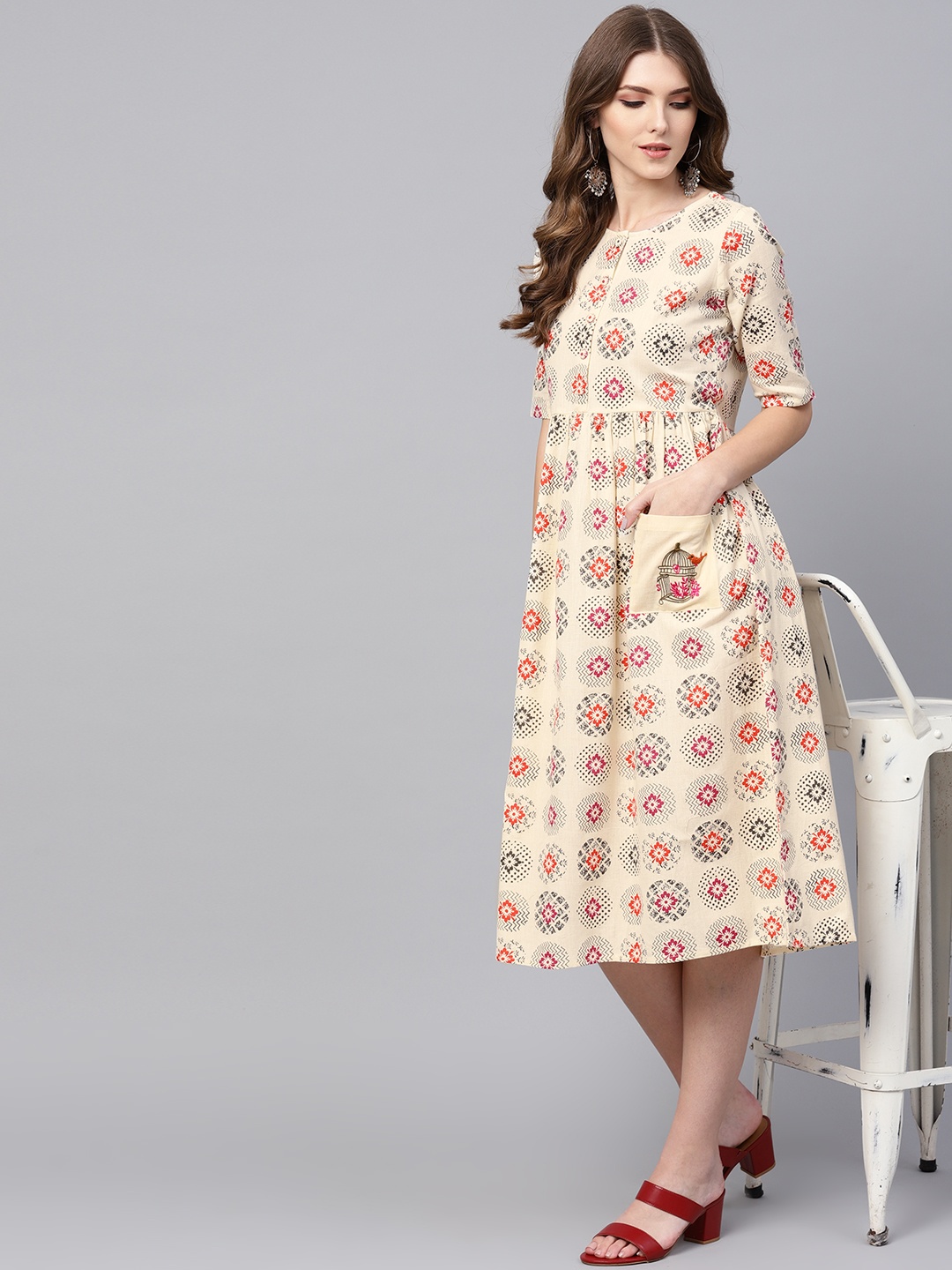

Indo Era Women Cream-Coloured & Orange Printed A-Line Dress