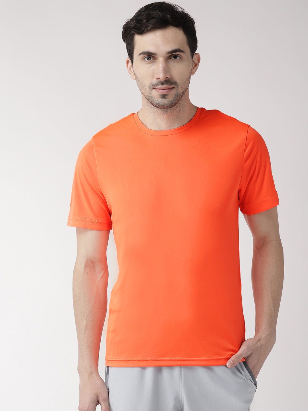 

Alcis Men Neon Orange Solid Round Neck T-shirt