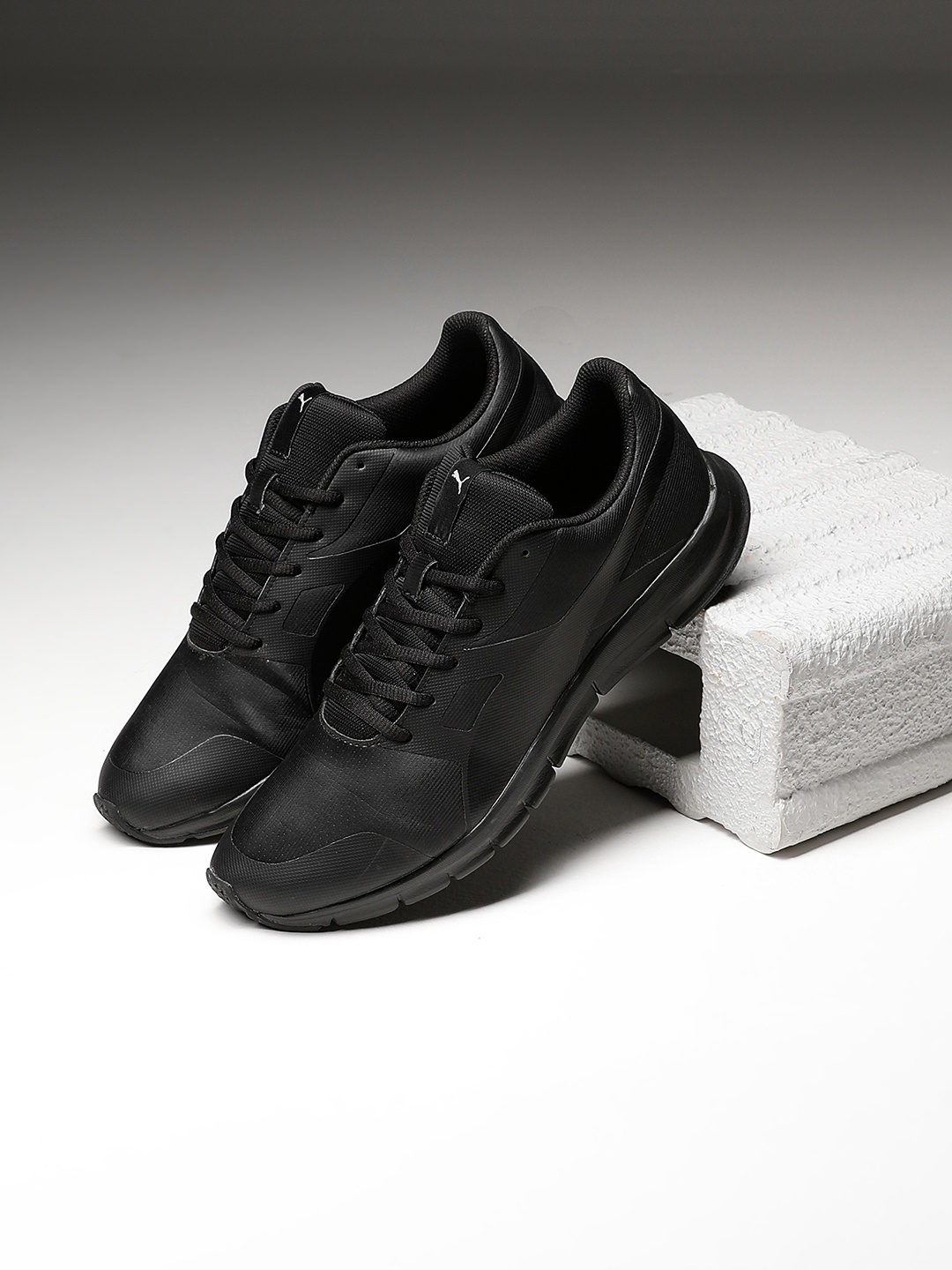 

Puma Unisex Black Flexracer SL Sneakers