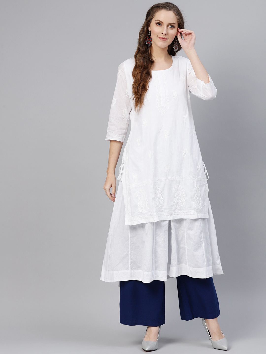 

Saadgi Women White Chikankari Embroidered Layered A-Line Kurta