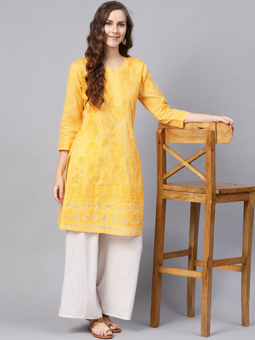 

Saadgi Women Yellow Chikankari Embroidered Handloom Straight Kurta