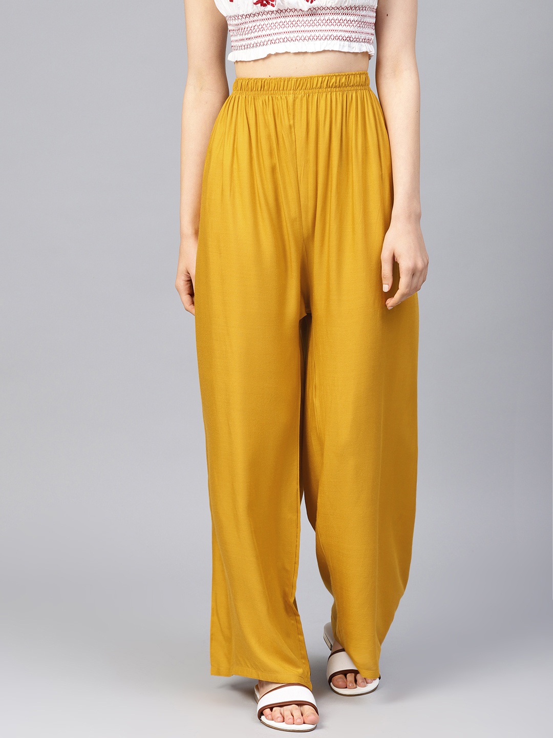 

Jompers Women Mustard Yellow Solid Wide Leg Palazzos