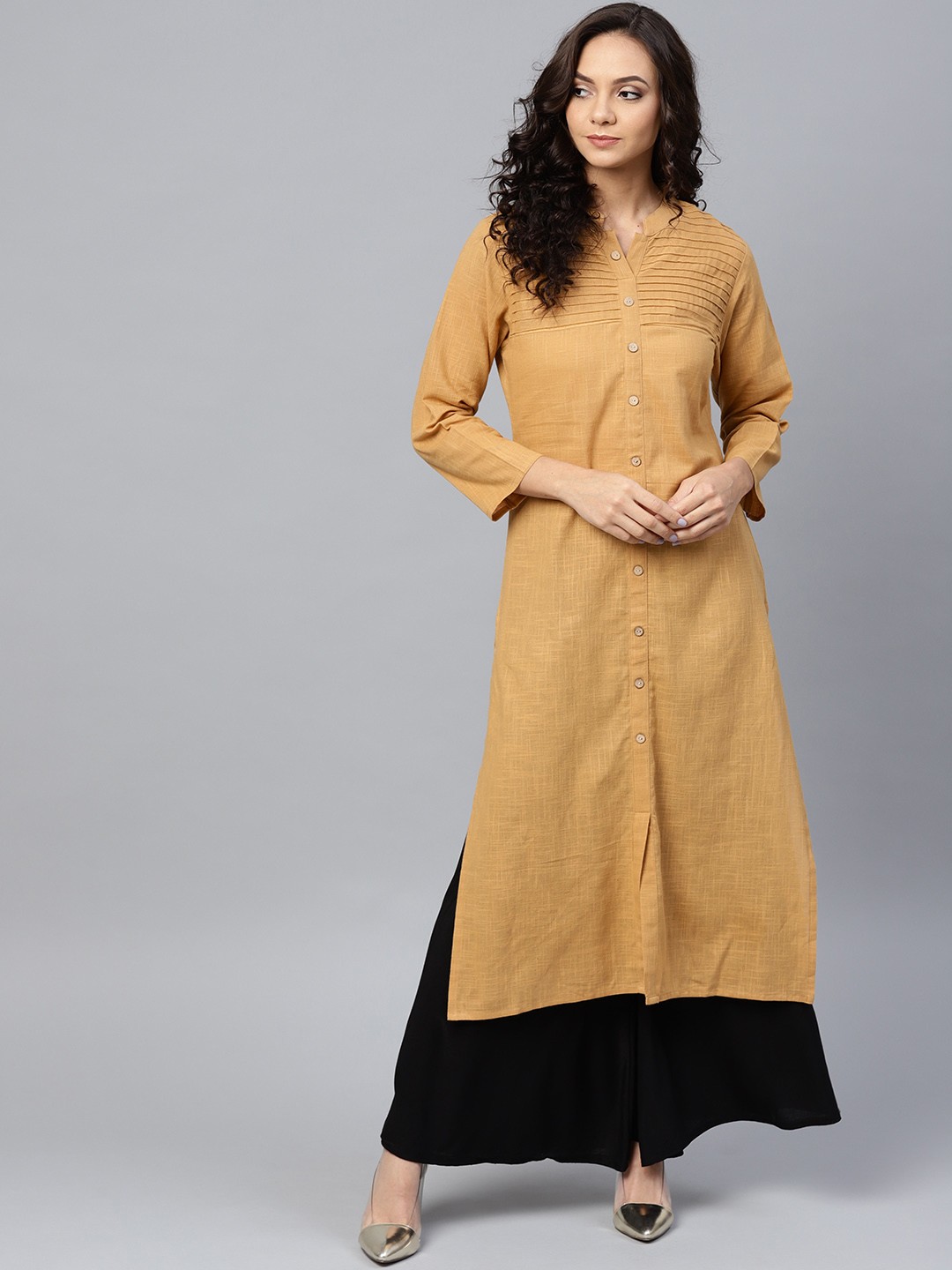 

Jompers Women Beige Solid Straight Kurta