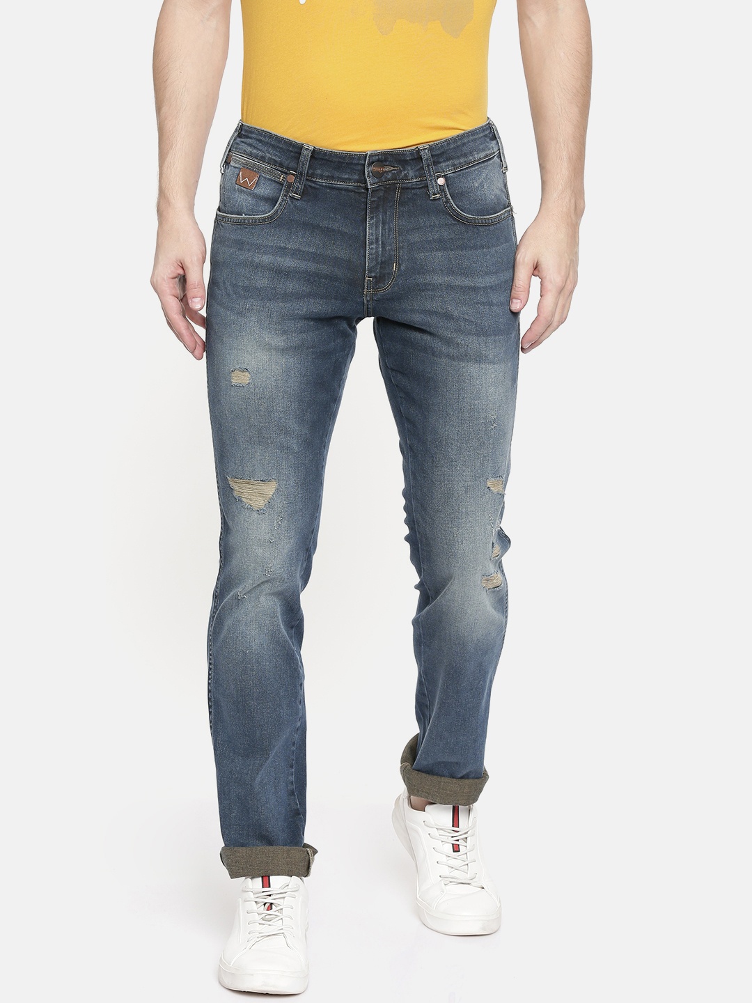 

Wrangler Men Blue Skanders Slim Fit Tapered Leg Mildly Distressed Stretchable Jeans