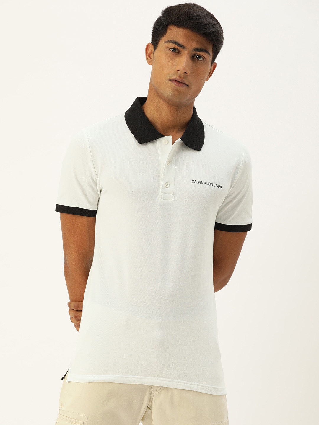 

Calvin Klein Jeans Men White Solid Polo Collar T-shirt