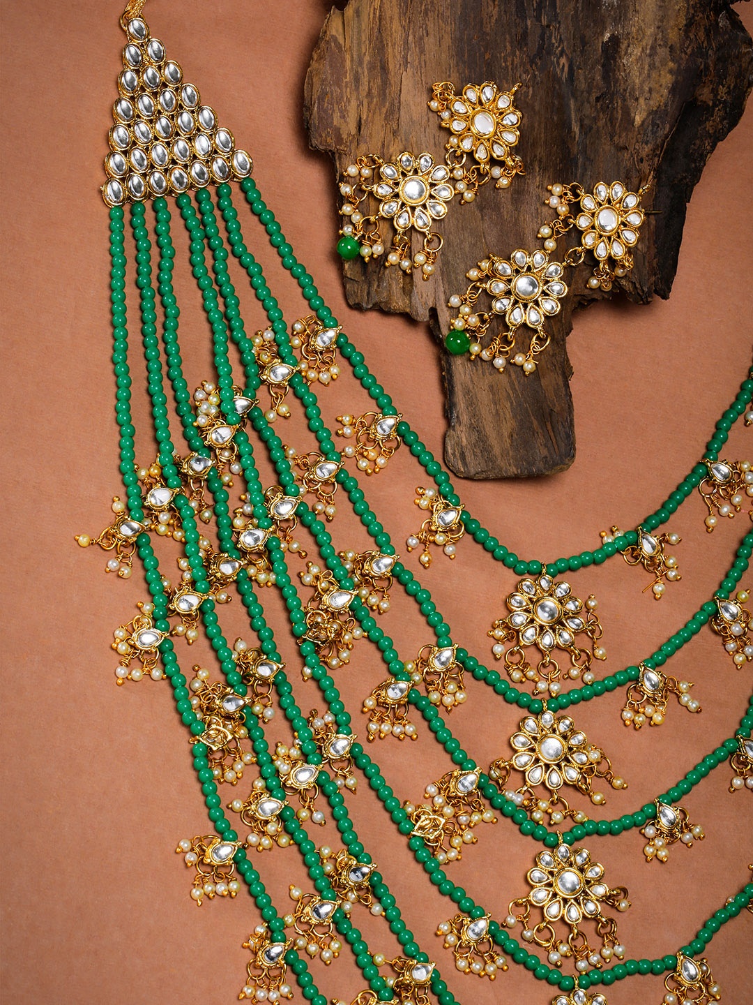 

Zaveri Pearls Gold-Toned & Green Multi Layered Kundan Jewellery Set