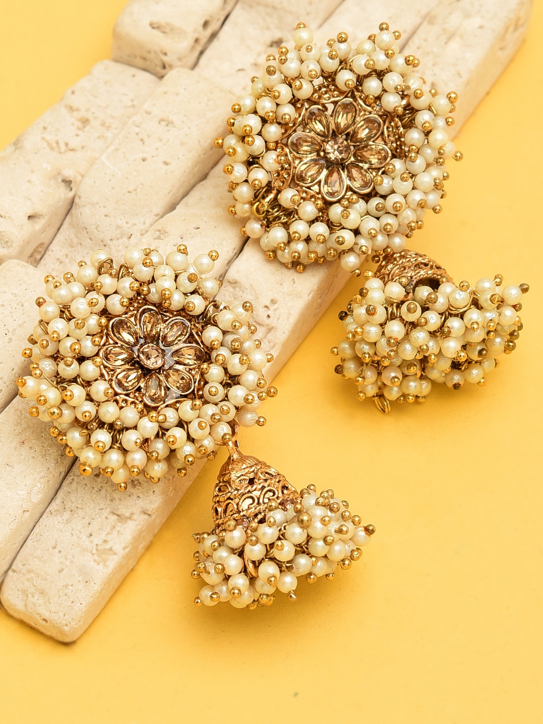 

Zaveri Pearls Gold-Toned & White Circular Jhumkas