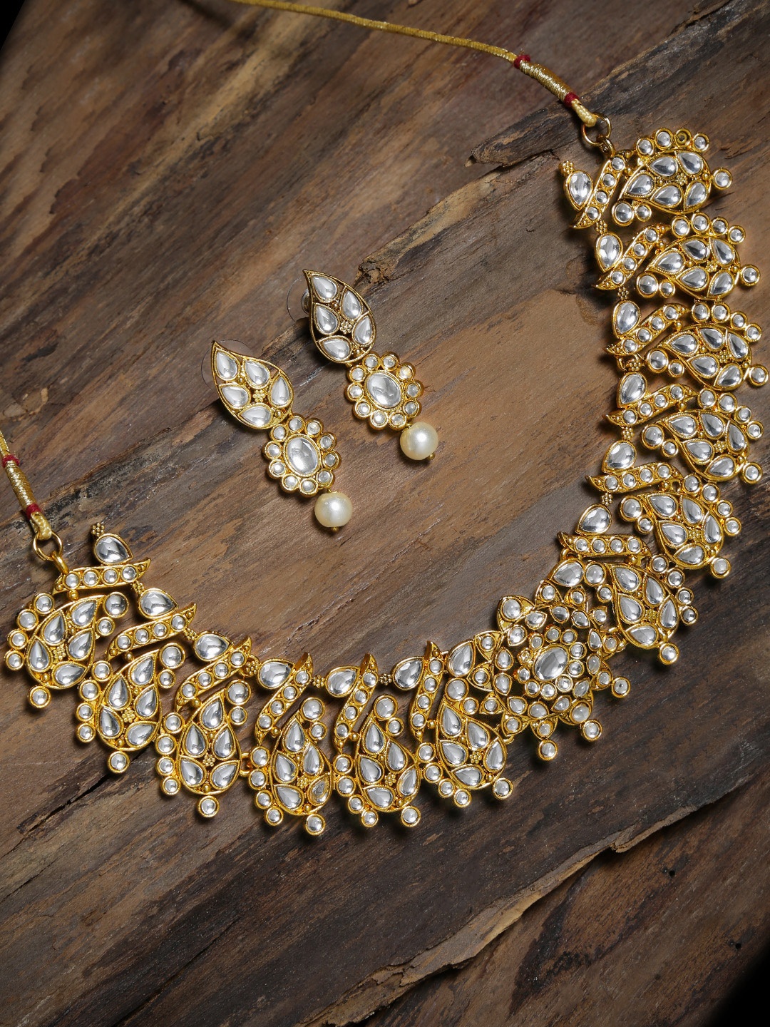 

Zaveri Pearls Gold-Plated Kundan Studded Jewellery Set