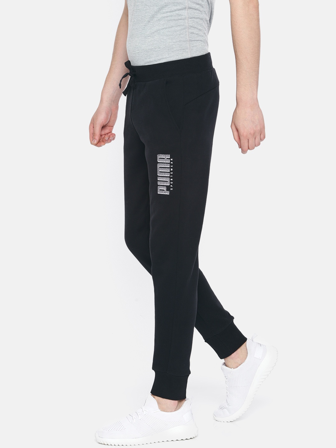 

Puma Men Black Solid Athletics Pants FL cl Puma Black Joggers