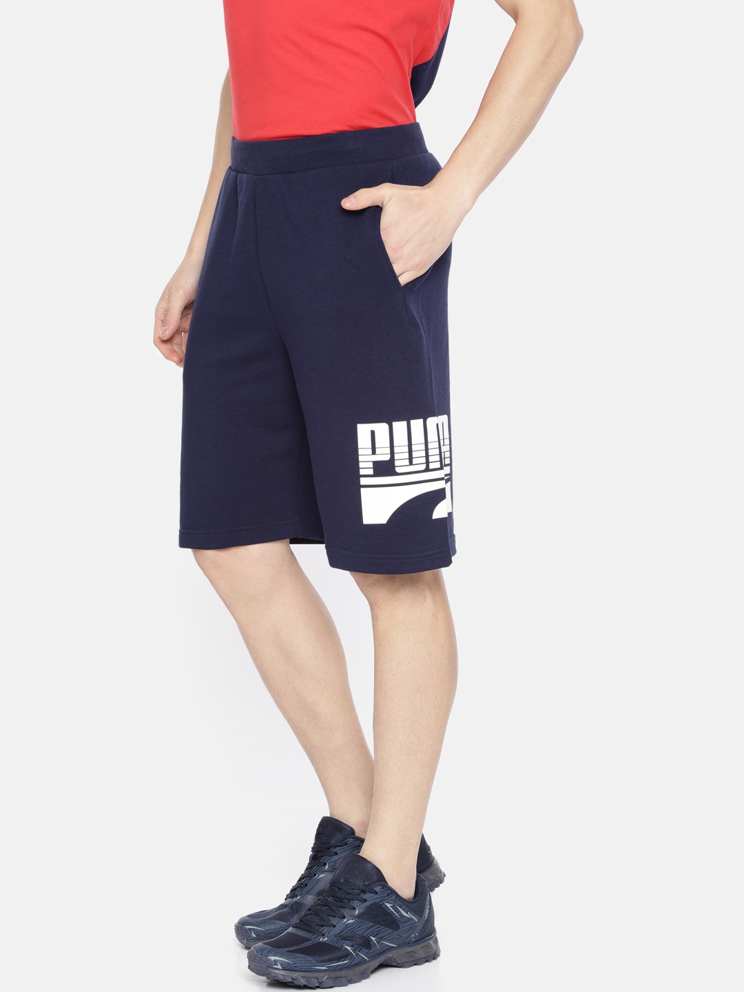 

Puma Men Navy Blue Solid Regular Fit Sports 9" Peacoat Shorts