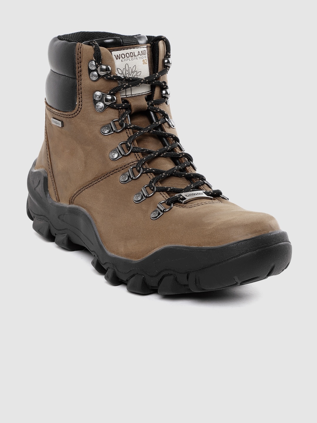 

Woodland Men Brown Solid Mid-Top Leather Flat Boots
