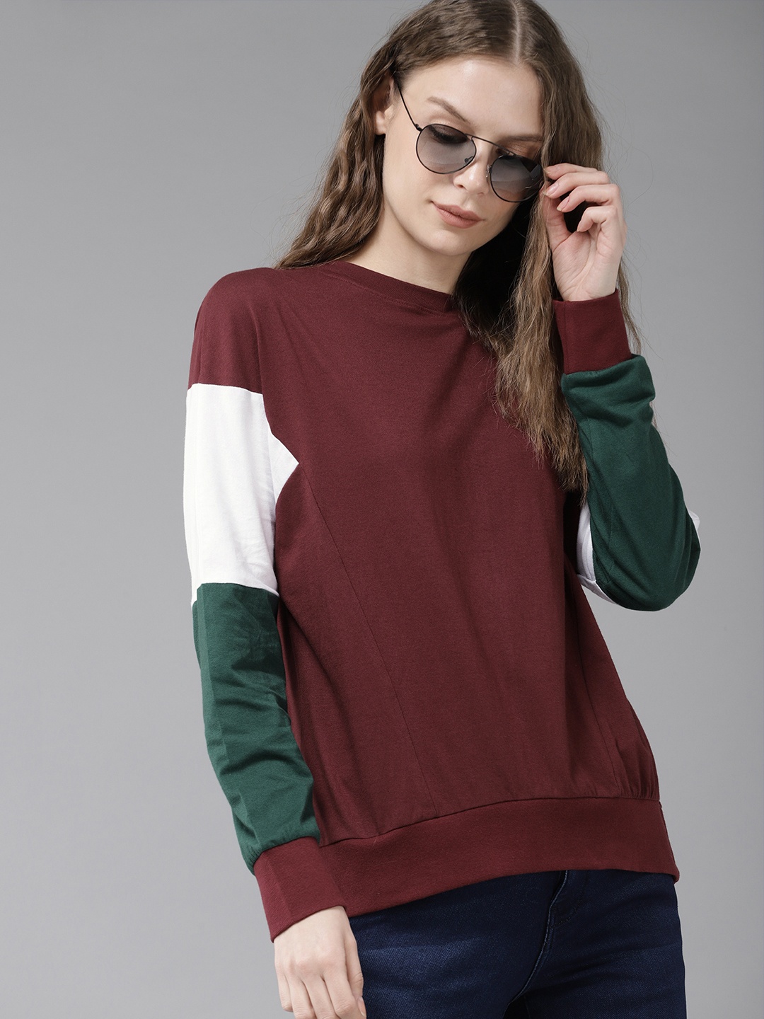

The Roadster Lifestyle Co Women Maroon Solid Sweatshirt