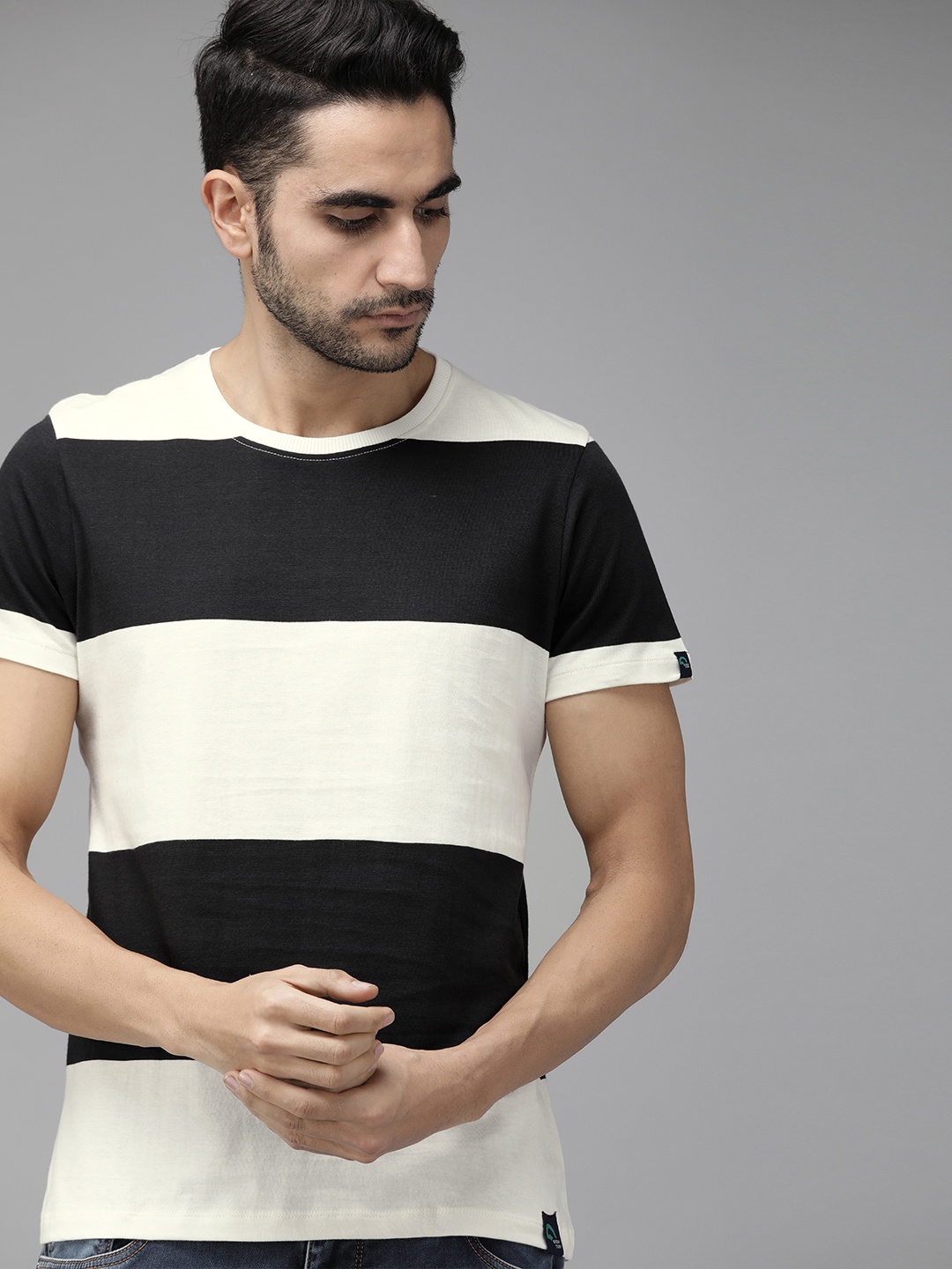 

The Roadster Lifestyle Co Men White & Black Colourblocked Round Neck Sustainable Greenturn T-shirt