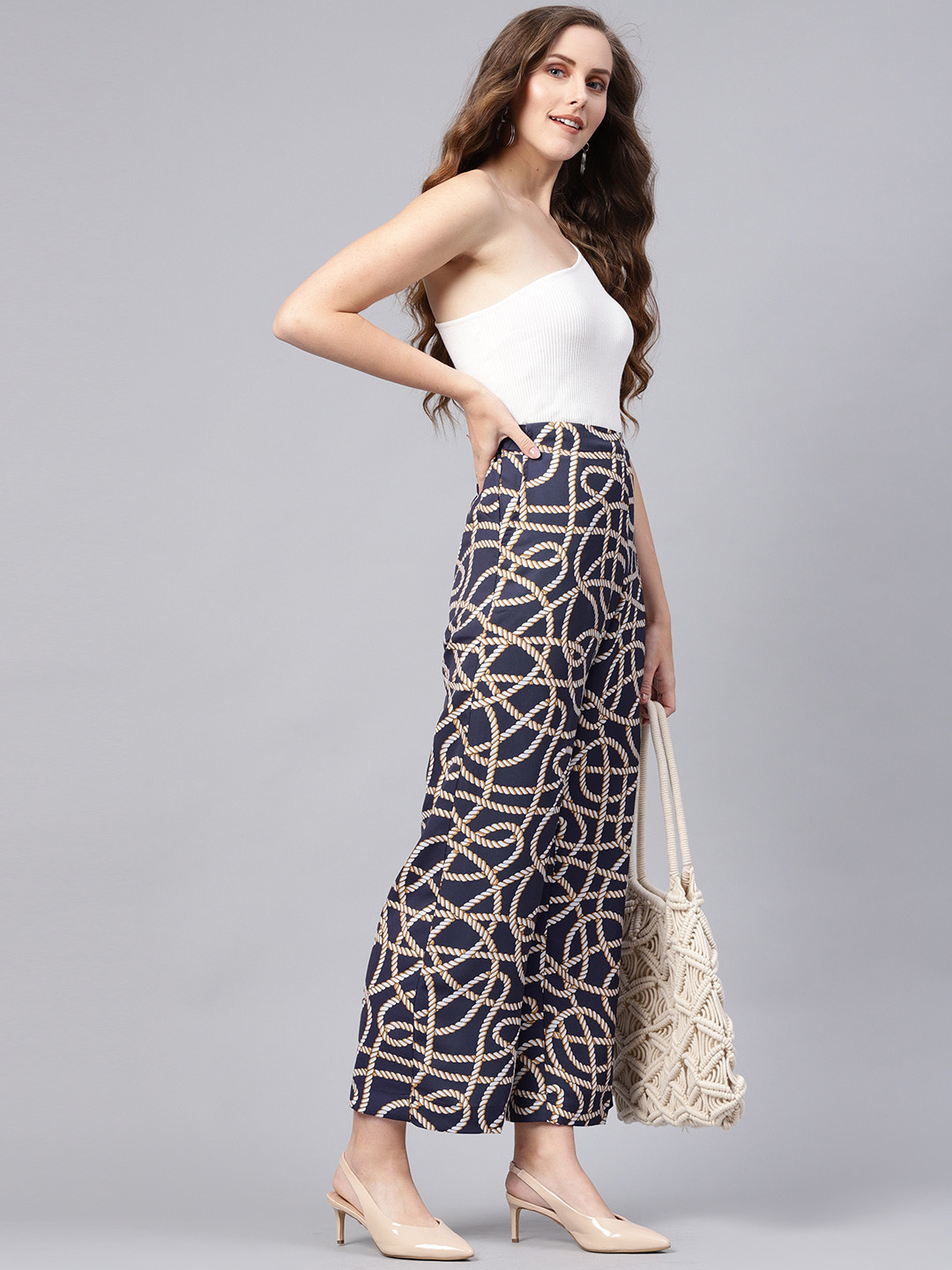 

SASSAFRAS Women Navy Blue & Off-White Regular Fit Printed Parallel Trousers