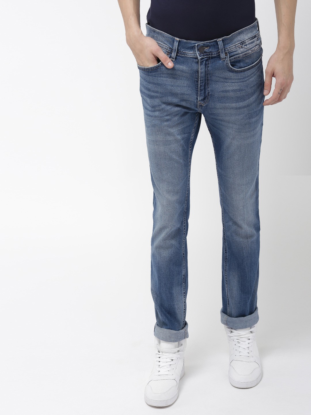 

Tommy Hilfiger Men Blue Slim Fit Mid-Rise Clean Look Stretchable Jeans