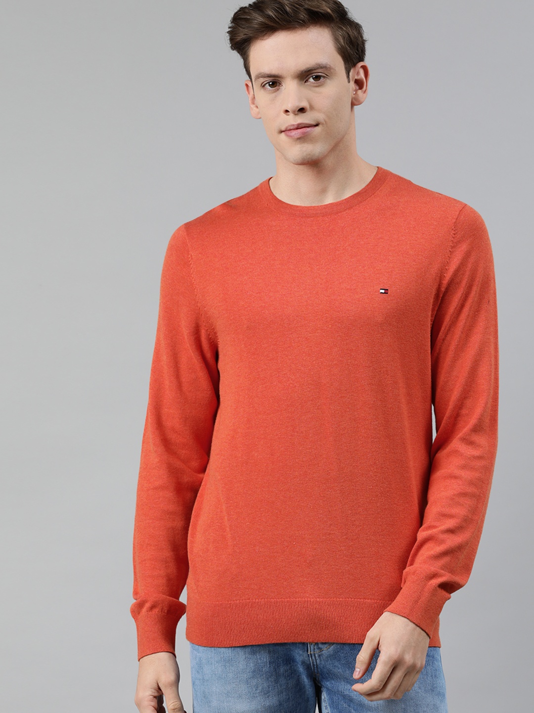 

Tommy Hilfiger Men Orange Solid Pullover Sweater