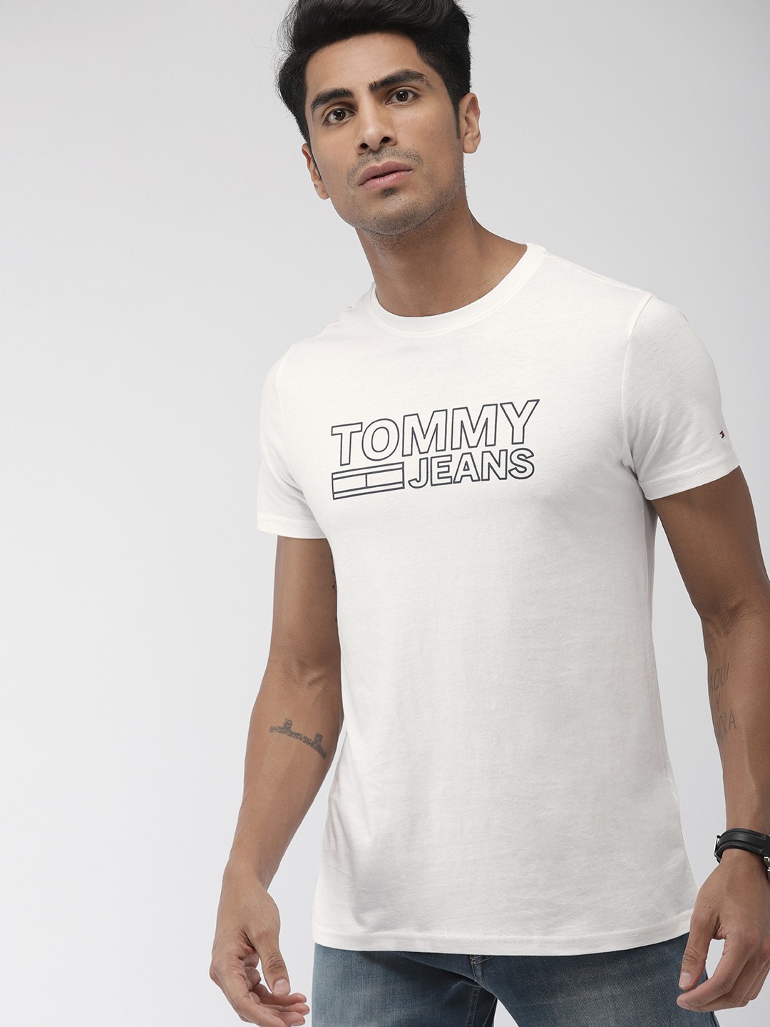 

Tommy Hilfiger Men Off-White Black Solid Round Neck Pure Cotton T-shirt