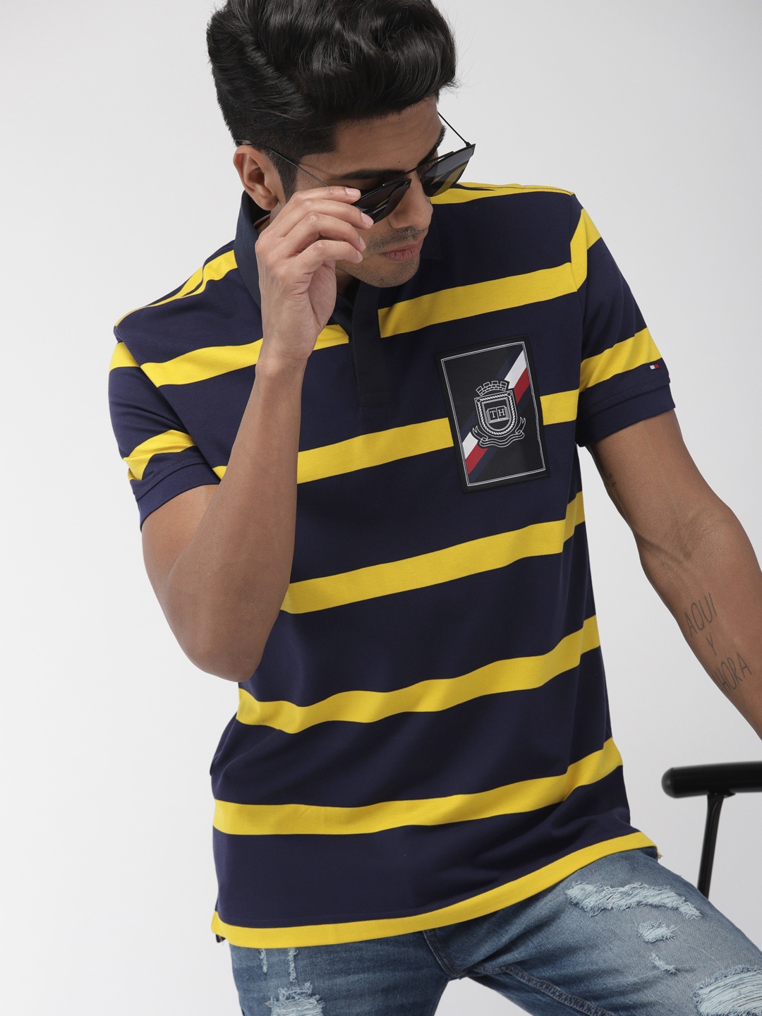 

Tommy Hilfiger Men Navy Blue Yellow Striped Polo Collar Pure Cotton T-shirt