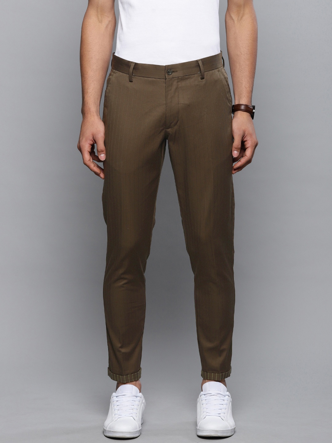 

Louis Philippe Men Olive Brown Comfy Tapered Fit Self Striped Formal Trousers