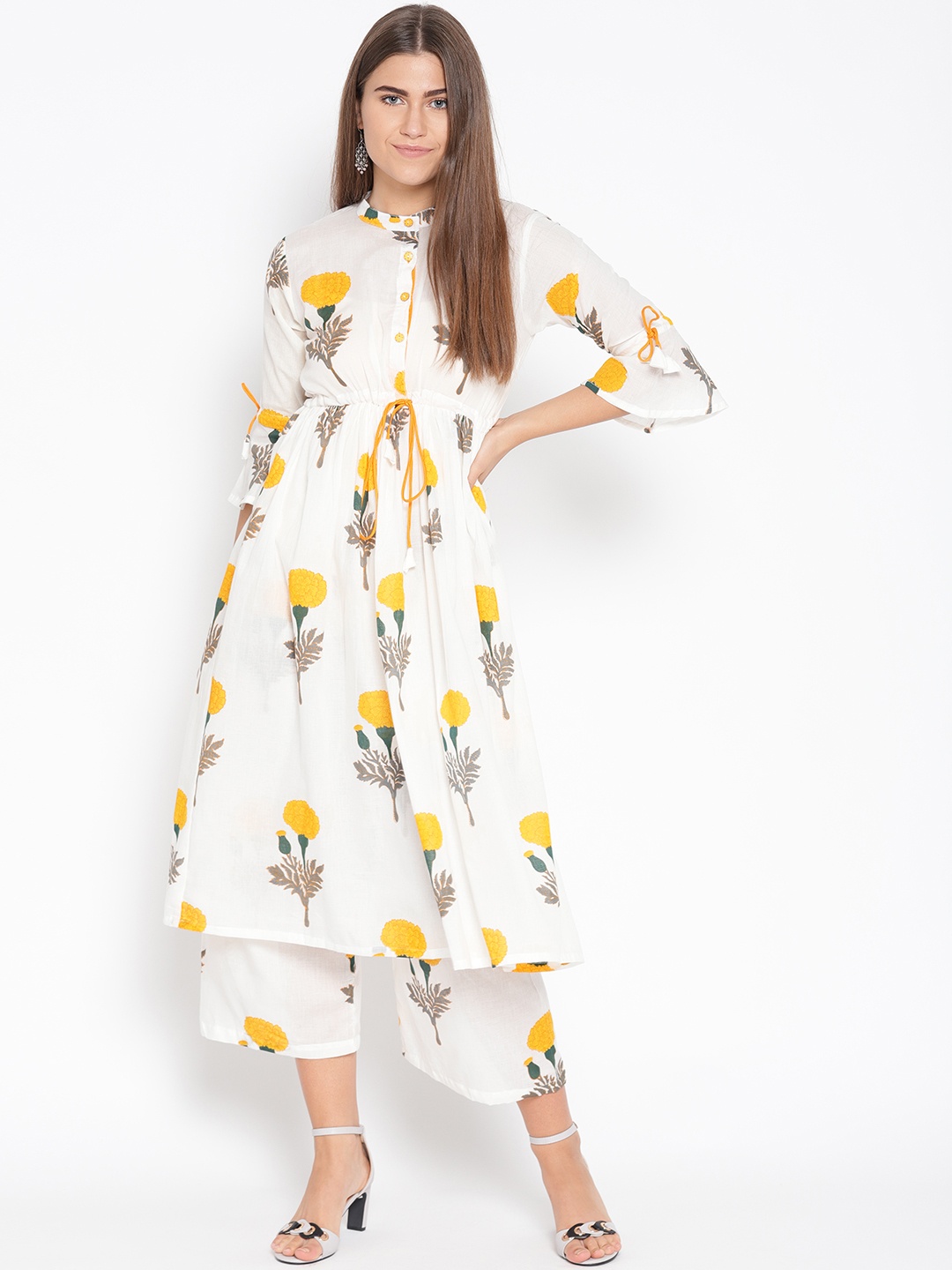 

Fabriko Women White & Yellow Printed Kurta with Palazzos