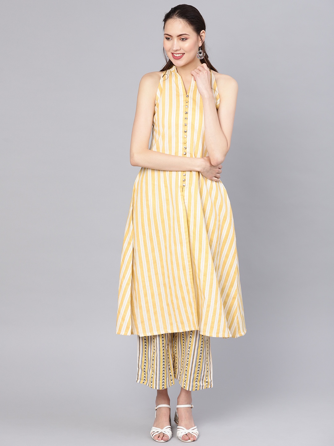 

GERUA Women Yellow & Off-White Striped Kurta with Palazzos