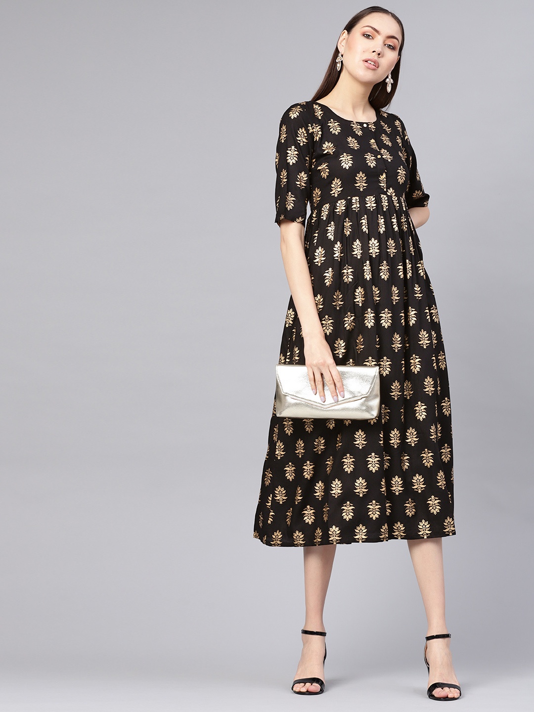 

GERUA Women Black & Golden Printed Midi A-Line Dress