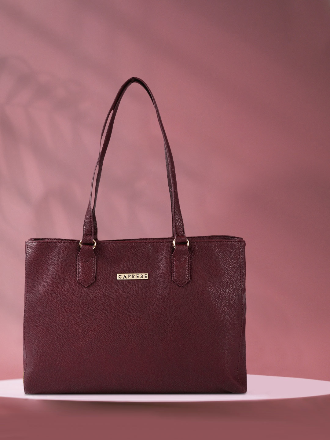 

Caprese Maroon Solid Shoulder Bag