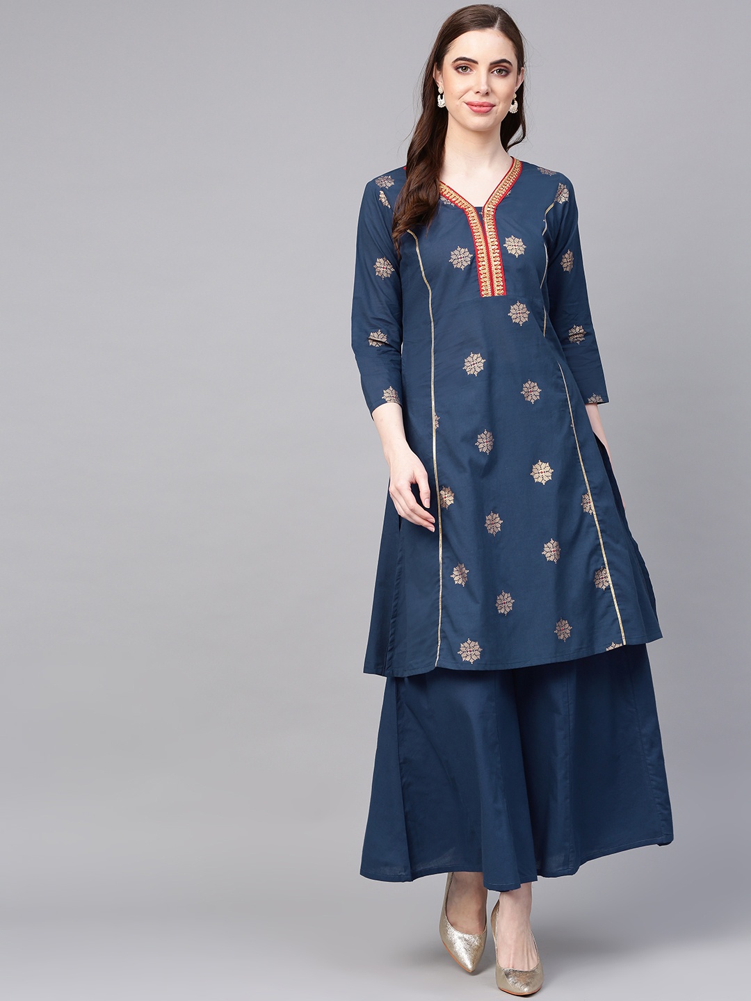 

Bhama Couture Women Teal Blue & Golden Printed A-Line Kurta with Palazzos