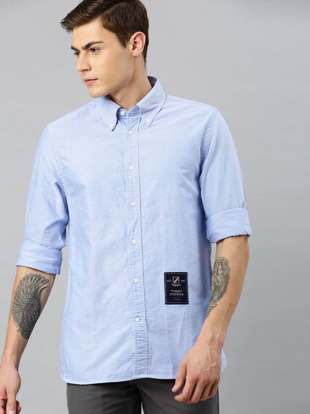 

Tommy Hilfiger Men Blue Regular Fit Solid Casual Shirt with Applique