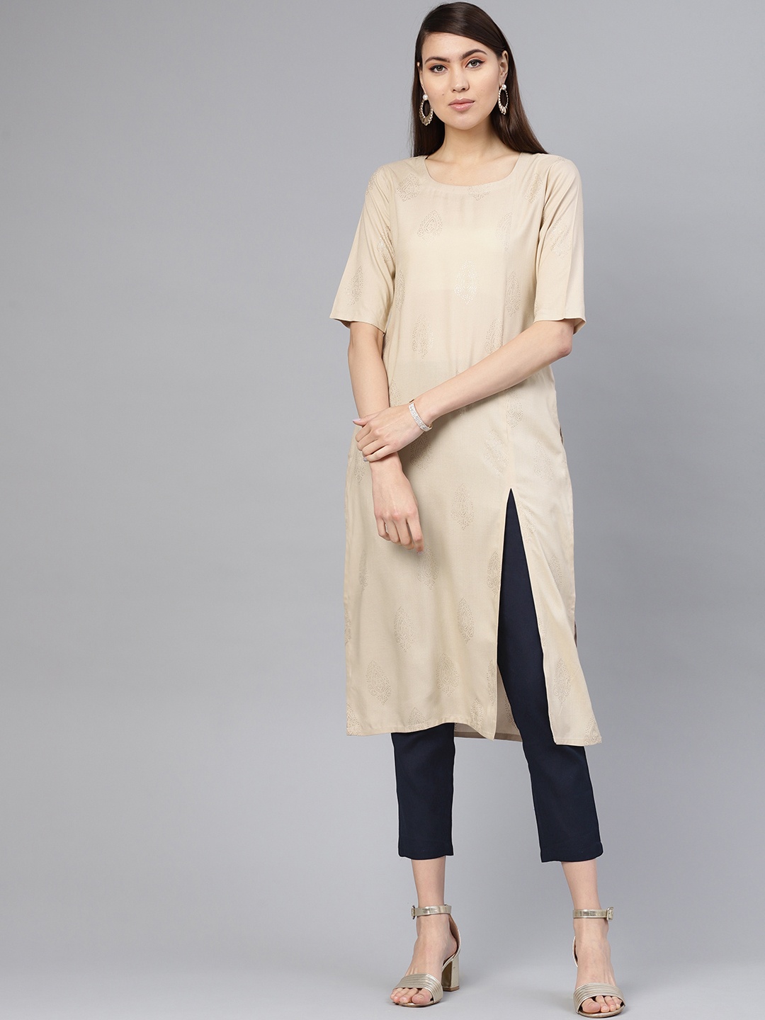 

Libas Women Beige & Navy Blue Block Printed Kurta with Trousers