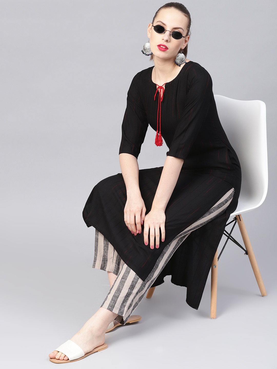 

Libas Women Black Self-Striped Straight Kurta