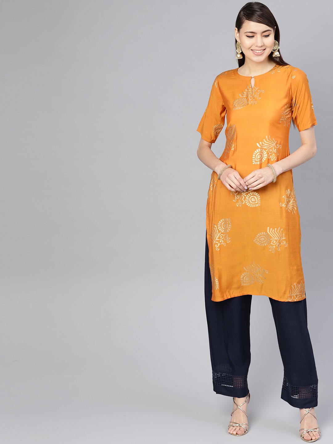 

Libas Women Mustard Yellow & Navy Blue Block Printed Kurta with Palazzos
