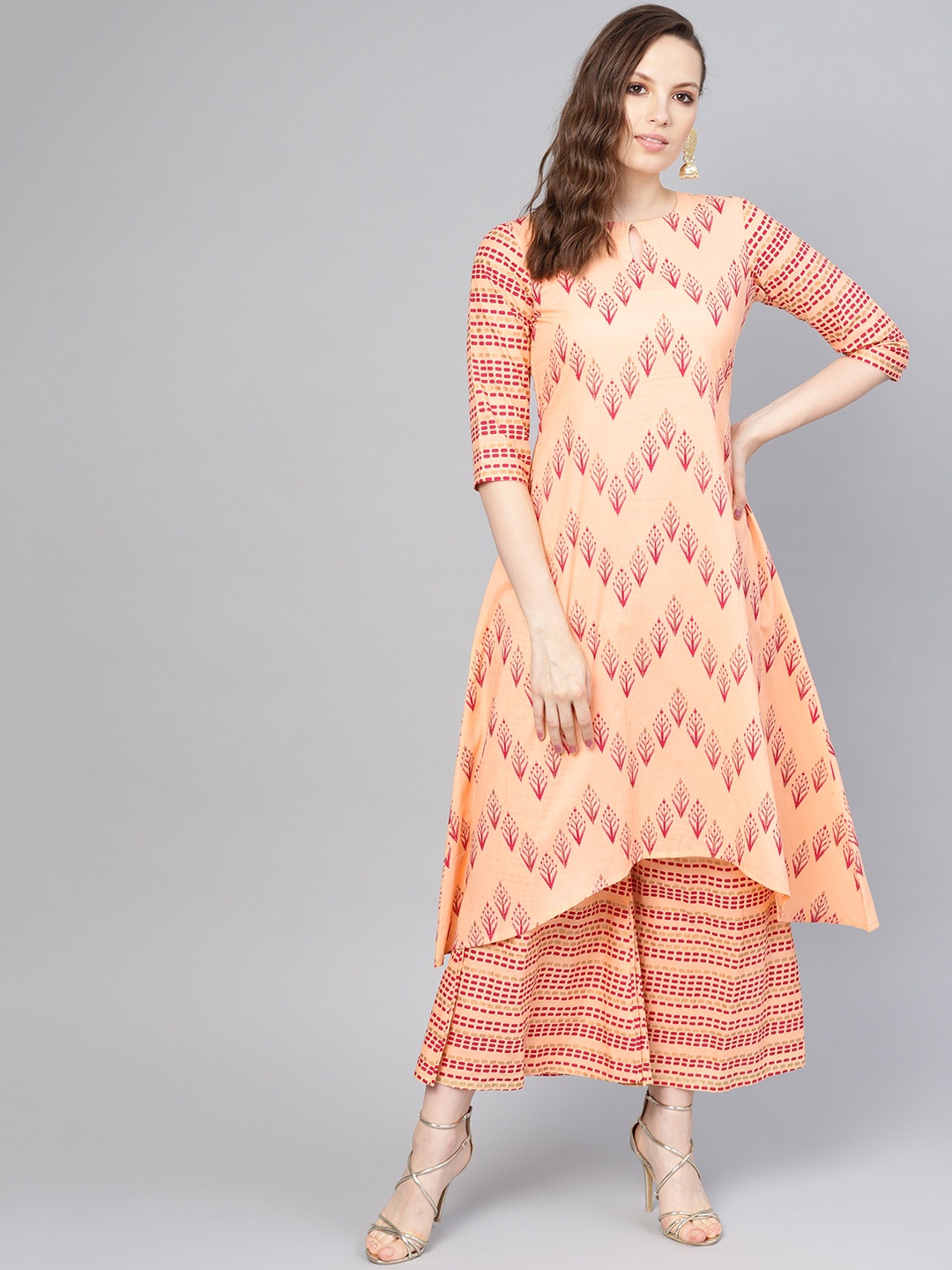 

Libas Women Peach-Coloured & Red Printed Kurta with Palazzos