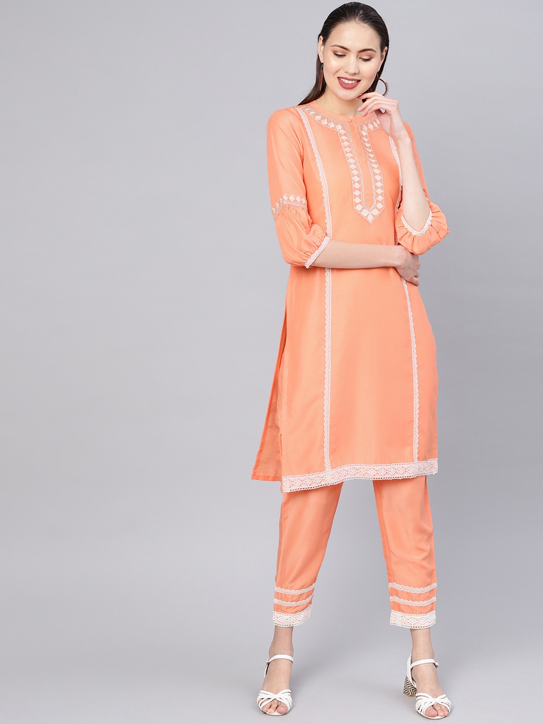

Libas Women Peach-Coloured Yoke Design Kurta with Trousers