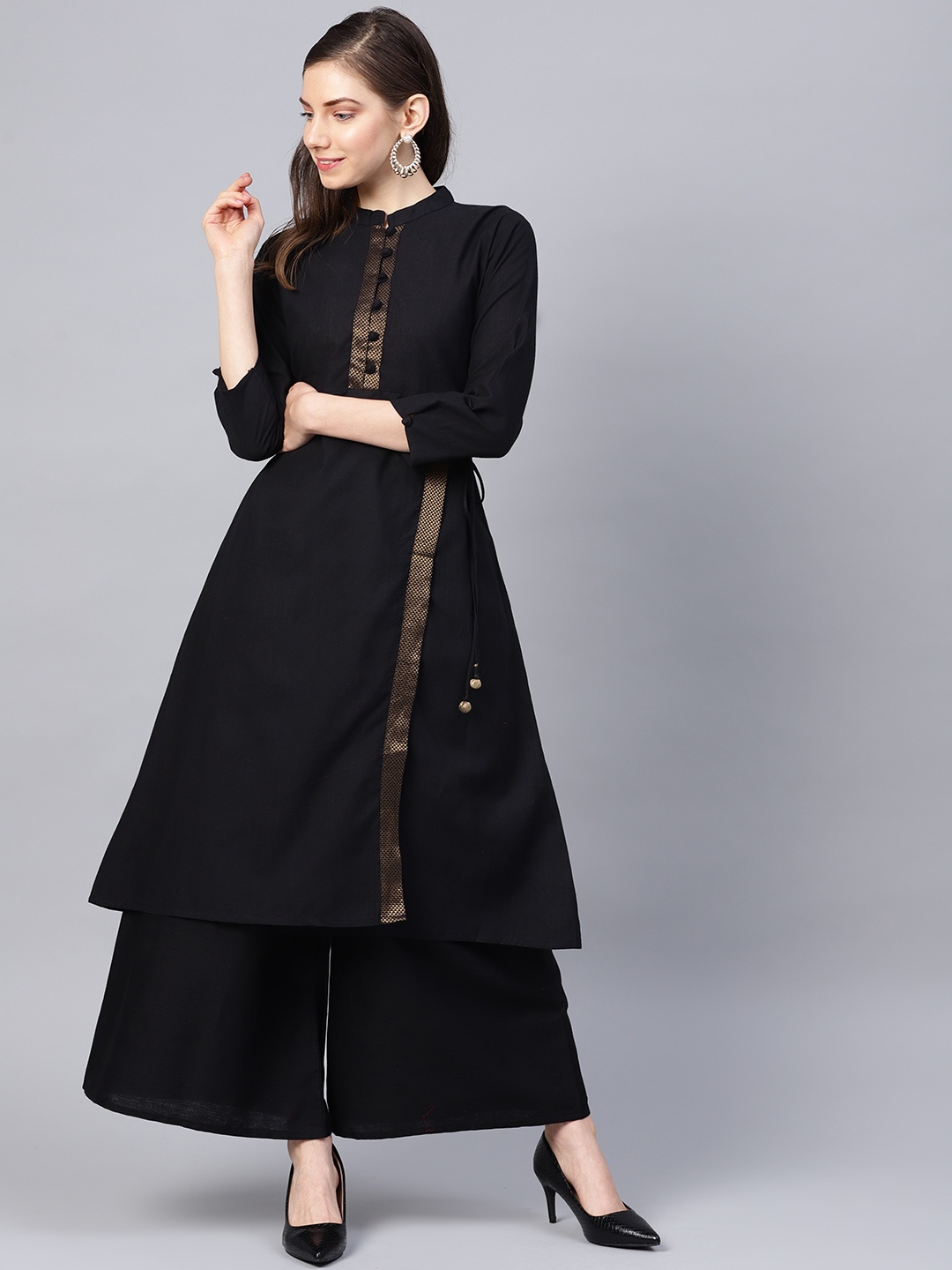 

Bhama Couture Women Black Solid Kurta with Palazzos