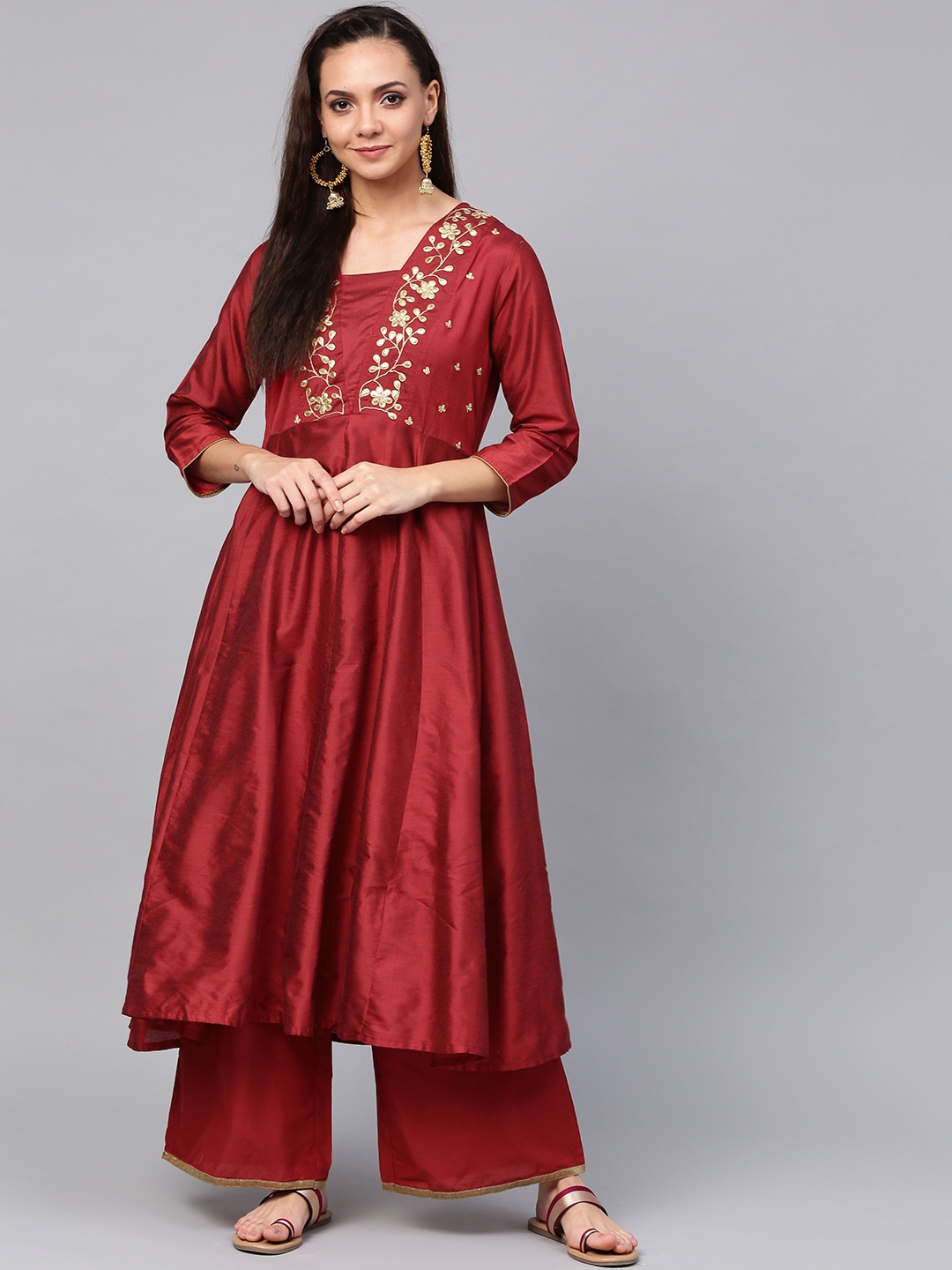 

Bhama Couture Women Maroon Yoke Design Kurta with Palazzos