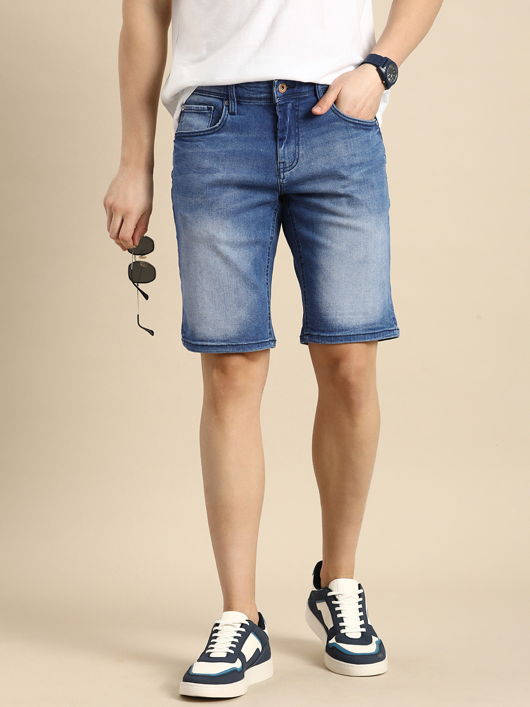 

Celio Men Solid Mid-Rise Above Knee Denim Shorts, Blue