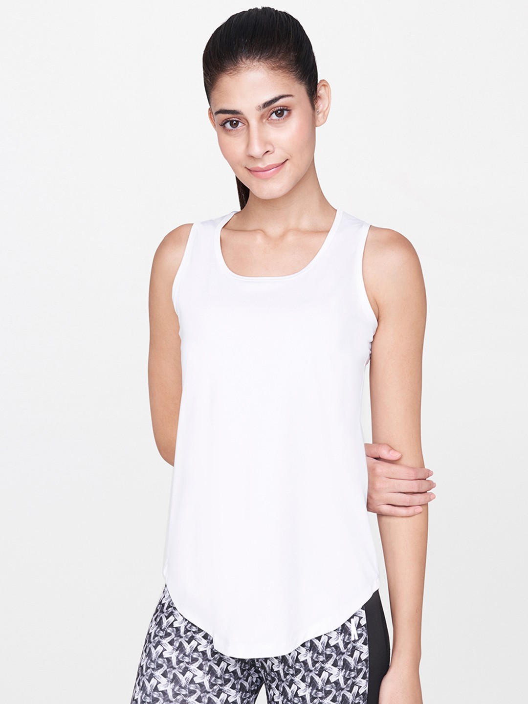 

AND Women White Solid Activewear Tank Top